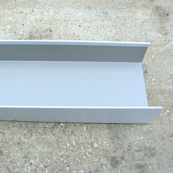 Fire Rated hoarding channel / end trim white powder coated steel.