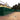 Green PVC hoarding at Belton House