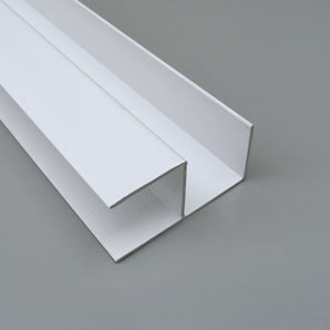 35mm hoarding corner profile trim in white PVC.