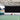 Freestanding hoarding with graphics being applied - Davis Cup Glasgow