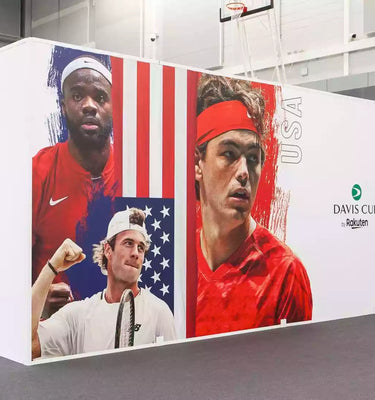 Freestanding hoarding sytstem in use at the Davis Cup in Glasgow, featuring tennis players graphics applied to the panels.
